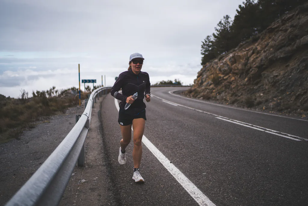 Monika Fahle running on a coastal road
